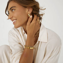 Delphine Gold Earrings, closeup